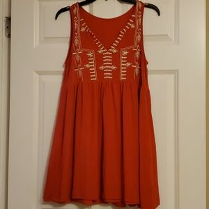 Orange tank dress with geometric embroidery